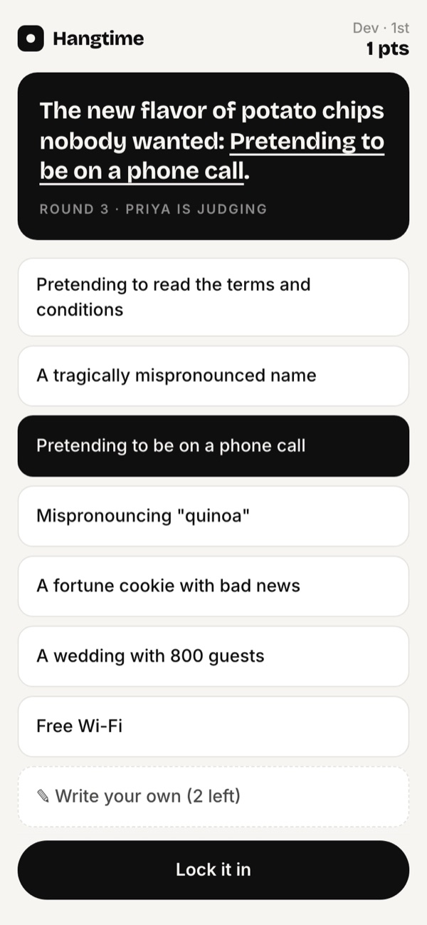 A phone showing a hand of answer cards with one selected